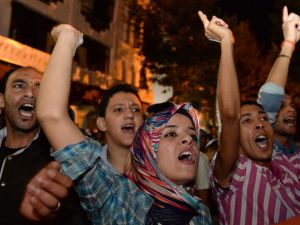  Protestors chant slogans during a demonstration on in Kenitra against the pardon by King Mohamed VI of Morocco of a Spanish pedophile (AFP/FADEL SENNA)