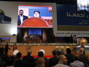 A general view shows Hezbollah's chief Hassan Nasrallah delivering a speech during a rare public appearance at a gathering to mark the "Al-Quds (Jerusalem) International Day" (AFP/ANWAR AMRO)