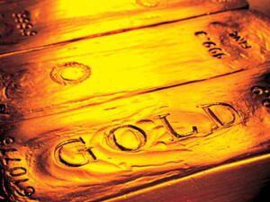 Gold hit a record $1,880 (Dh6,905) an ounce on Friday as European stock markets fell Gold hit a record $1,880 (Dh6,905) an ounce on Friday as European stock markets fell