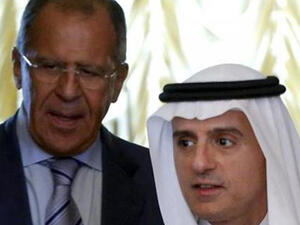 Russian Foreign Minister Sergei Lavrov (L) and Saudi Foreign Minister Adel al-Jubeir enter a hall for a meeting in the Russian capital, Moscow, on August 11, 2015. (AFP)
