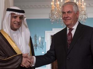 US Secretary of State Rex Tillerson (R) and Saudi Foreign Minister Adel al-Jubeir shake hands prior to talks at the State Department on May 2, 2017. (AFP/Nicholas Kamm)