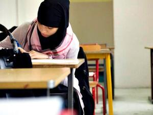 Wearing a hijab “could be interpreted as sexualization” of school children, said the chief inspector of schools (AFP/File) 