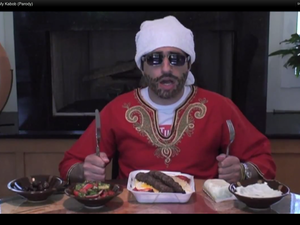Towel on head? Check. Strong Accent? Check. All Arab stereotypes covered? Check.
