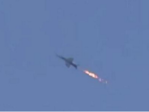 Videos emerged Monday afternoon purporting to show the downing of a Syrian (or Russian) aircraft in eastern Ghouta, now social media's debating what happened. (Twitter)