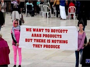 Arabic news and social media took off  with the story of two French women holding up an inflammatory banner about Arabs. Problem is, well, Photoshop. (Twitter)