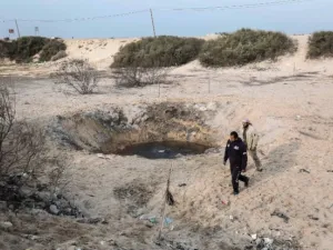 The site of an Israeli air strike targeting a Hamas base in Khan Yunis in the Gaza Strip in December 2017 (AFP/file photo)
