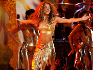Soon after she seemed to be getting in touch with her Arab side, Shakira, staying in the Middle East, associates herself with
Israel- a move which might upset some 'home' fans.