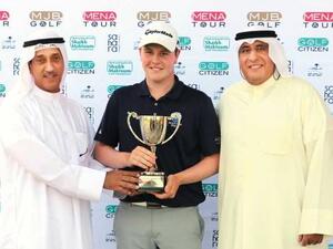Winner Robert MacIntyre with Yousef Abdul Aziz Al Qatami and Wael Abdul Rahman Al Welayti, both members of the Sahara Kuwait’s golf advisory committee. (Photo: Organizers)