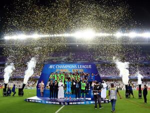 Jeonbuk players celebrate as they are crowned champions following their AFC Champions League final between UAE's Al-Ain and South Korea's Jeonbuk Hyundai Motors at the Hazza bin Zayed Stadium in Al-Ain on November 26, 2016.
NEZAR BALOUT / AFP
