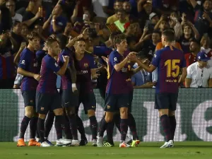 لاعبو برشلونة خلال المباراة مع توتنهام ضمن الكأس الدولية للأبطال