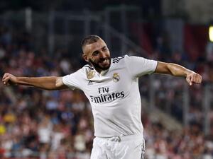 Real Madrid's French forward Karim Benzema celebrates his second goal during the Spanish league football match between Girona FC and Real Madrid CF at the Montilivi stadium in Girona on August 26, 2018.
Pau BARRENA CAPILLA / AFP