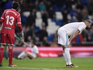 Real Madrid's French forward Karim Benzema bends at the end of the Spanish 'Copa del Rey' (King's cup) quarter-final second leg football match between Real Madrid CF and CD Leganes at the Santiago Bernabeu stadium in Madrid on January 24, 2018.
JAVIER SORIANO / AFP