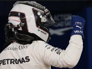Mercedes' Finnish driver Valtteri Bottas celebrates after taking the pole position at the end of the qualifying for the Bahrain Formula One Grand Prix at the Sakhir circuit in Manama on April 15, 2017.
Karim Sahib / AFP