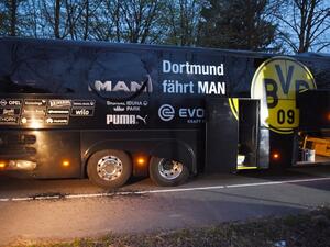 Borussia Dortmund's damaged bus is pictured after an explosion some 10km away from the stadium prior to the UEFA Champions League 1st leg quarter-final football match BVB Borussia Dortmund v Monaco in Dortmund, western Germany on April 11, 2017.
Patrik STOLLARZ / AFP