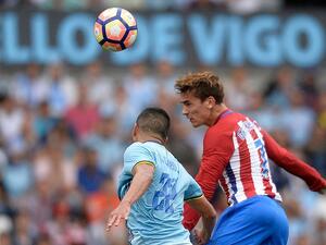 غريزمان (يمين) يقود أتلتيكو لفوزه الأول هذا الموسم