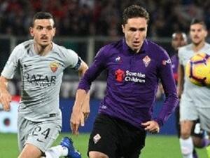 صراع على الكرة بين كييزا (يمين) وفلورينزي