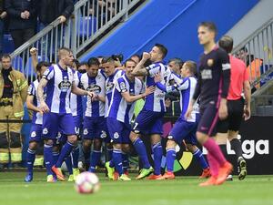 لاعبو ديبورتيفو يحتفلون بأحد الأهداف