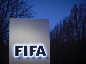 This picture taken on February 15, 2016 shows the logo of the International Federation of Association Football (FIFA) at the FIFA headquarters in Zurich