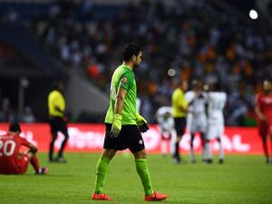 Tunisia's goalkeeper Aymen Mathlouthi walks off the pitch at the end of the 2017 Africa Cup of Nations quarter-final football match between Burkina Faso and Tunisia at the Stade de l'Amitie Sino-Gabonaise in Libreville on January 28, 2017.
GABRIEL BOUYS / AFP