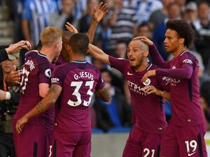 لاعبو مانشستر سيتي يحتفلون خلال المباراة