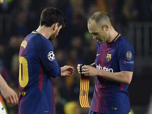 صورة أرشيفية لإنييستا وميسي