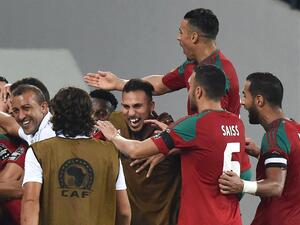 Morocco's players celebrate their third goal during the 2017 Africa Cup of Nations group C football match between Morocco and Togo in Oyem on January 20, 2017.
ISSOUF SANOGO / AFP