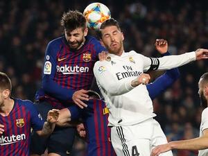 راموس وبيكيه خلال المباراة