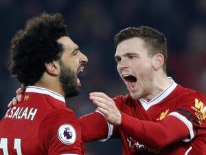 صلاح (يسار) يقود ليفربول للفوز على المتصدر