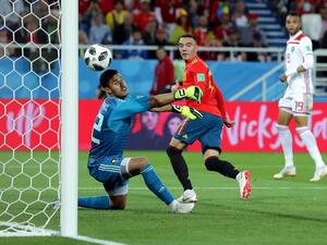 آسباس ينقذ إسبانيا من خسارة محققة