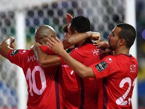 Tunisia's players celebrate their fourth goal during the 2017 Africa Cup of Nations group A football match between Zimbabwe and Tunisia at the Stade de l'Amitie Sino-Gabonaise in Libreville on January 23, 2017.
GABRIEL BOUYS / AFP