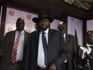 South Sudan President Salva Kiir (C), followed by Vice President James Wani Igga (2nd R), leaves the conference room as artillery fire broke out near the presidential palace in Juba on July 8, 2016. (AFP/Charles Atiki Lomodong)