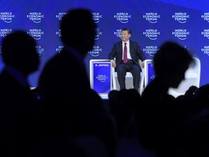China's President Xi Jinping delivered a speech during the first day of the World Economic Forum, on January 17, 2017 in Davos.  (AFP/Fabrice Coffrini)