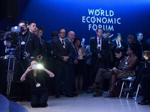 Members of the press at Davos 2017. (AFP/Fabrice Coffrini)