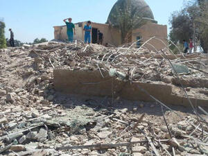 A photo showing the wreckage of the shrine in the Syrian town of Busaira. (Photo courtesy of the Syrian Observatory for Human Rights)
