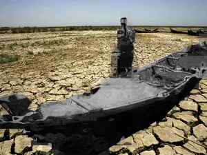 The dead marshes (AFP/FILE, edited by Rami Khoury/Al Bawaba)