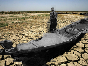 The dead marshes (AFP/FILE, edited by Rami Khoury/Al Bawaba)