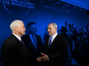 Mike Pence and Benjamin Netanyahu at the Warsaw summit (AFP/FILE, edited by Rami Khoury/Al Bawaba)