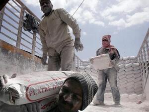 Syrian workers eyed with suspicion as Jordanian government looks to legitimize workers. [Haytham al-Moussawi]