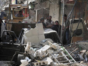 Over 100,000 people have died in Syria since the outbreak of the civil war between President Assad's regime and rebel forces. (Image credit: AFP)