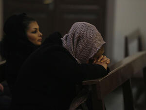 Armenian Iranian Christians pray during a Christmas Eve mass (AFP/FILE)