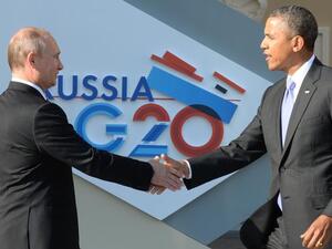 Russia’s President Vladimir Putin welcomes US President Barack Obama at the start of the G20 summit on September 5, 2013 in Saint Petersburg. (AFP)