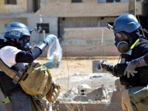 OPCW workers manually dismantle equipment in Syria. [breakingnews.sy]