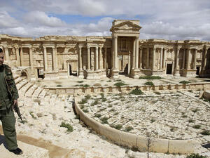 A Syrian policeman patrols the ancient city of Palmyra, 2014.  (AFP/Joseph Eid)