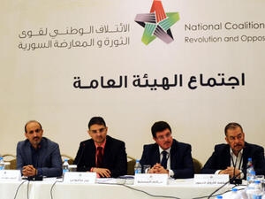 Members of the Syrian National coalition (SNC) attend a meeting of the National Coalition on November 9, 2013, in Istanbul. [AFP]