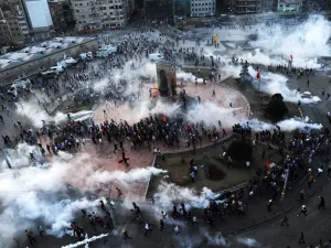 Riot police fire tear gas on demonstrators in Istanbul's Taksim Square, June 11 2013.  (AFP/Bulent Kilic)