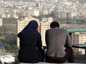 What do average Iranians see in their futures as the nuclear deal gets implemented?  (AFP/Atta Kenare)