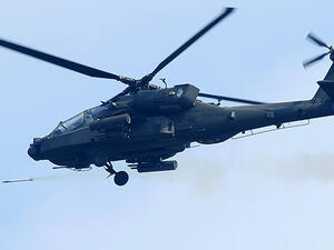 In an overnight helicopter raid US special forces kill Daesh oil minister Abu Sayyaf and capture wife for questioning.  (AFP/Park Ji-Hwan)