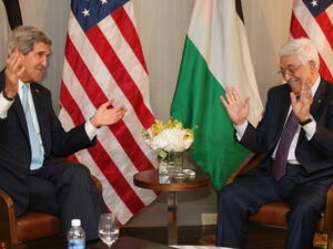 Secretary of State John Kerry with Palestinian Authority President Mahmoud Abbas. [Mario Tama/Getty Images]
