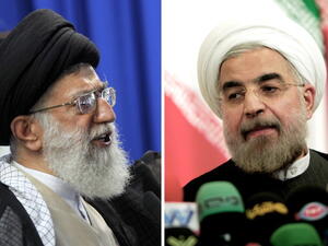 Iran's supreme leader Ayatollah Ali Khamenei and newly elected president, Hassan Rouhani, attending [BEHROUZ MEHRI/AFP]