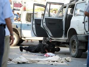 Tunisian police inspect the site of an exchange of fire between police forces and members of a Salafist group on October 25, 2013. [AFP]

